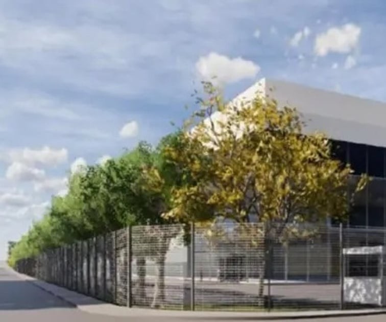 Gambar rancangan pusat data Nscale di Loughton, Essex, dengan pagar dan pepohonan