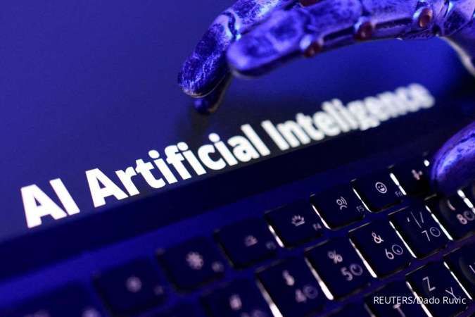 Tangan robot di atas papan ketik dengan tulisan AI Artificial Intelligence